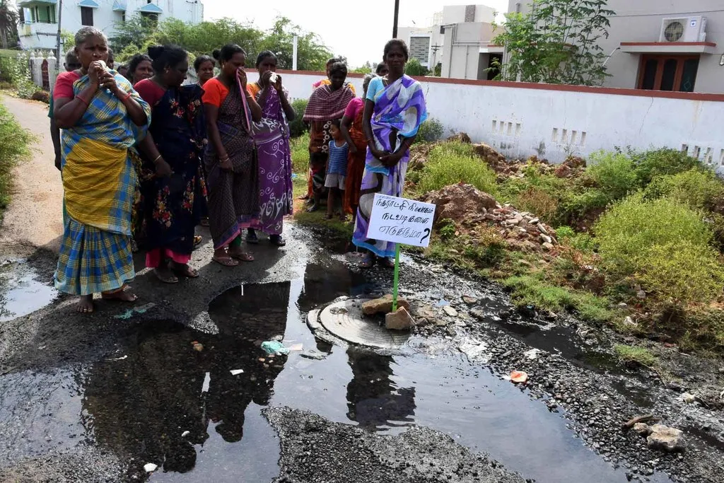 Sewer  Gutter running on the road ... 